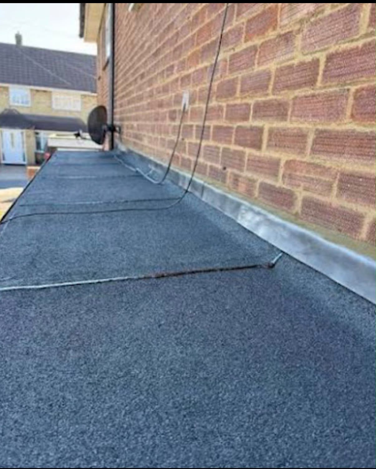 Flat felt roof with lead flashing on a West Midlands property, Clean Gutters & Roofing Services