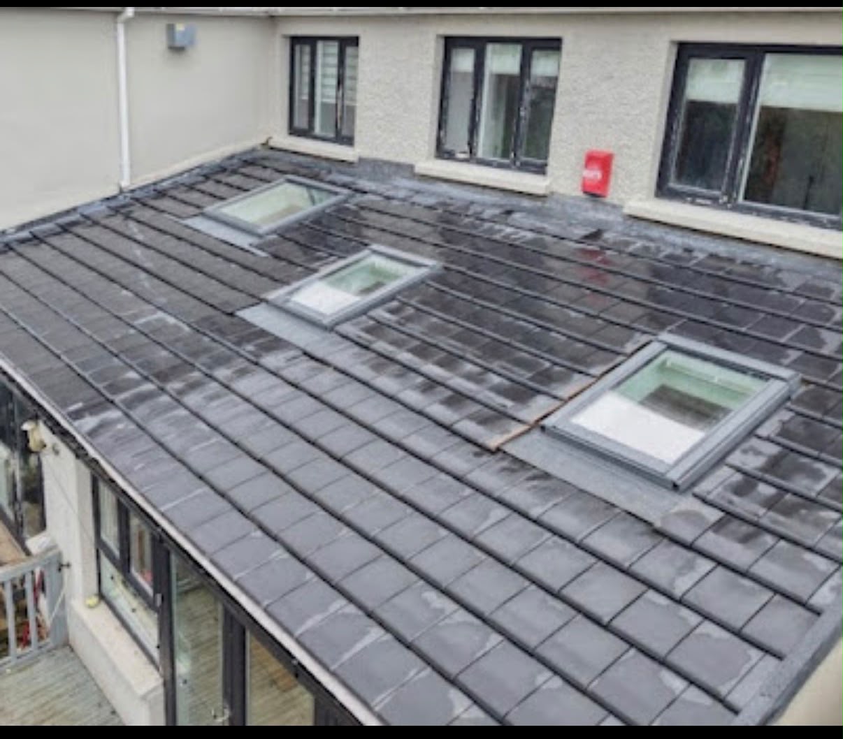 Flat felt roof with lead flashing detail in West Midlands by Clean Gutters & Roofing Services