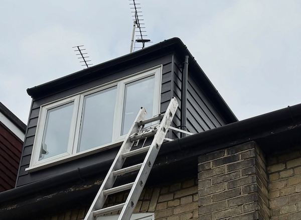 New gutters fitted during a roof repair project